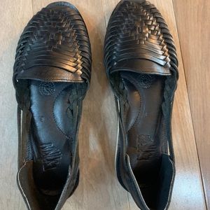 Black leather slip on shoes.  Never been worn.